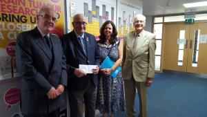 David Large and Hugh Reed presenting Rotary cheque